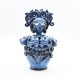Pupa in ceramica blu cangiante